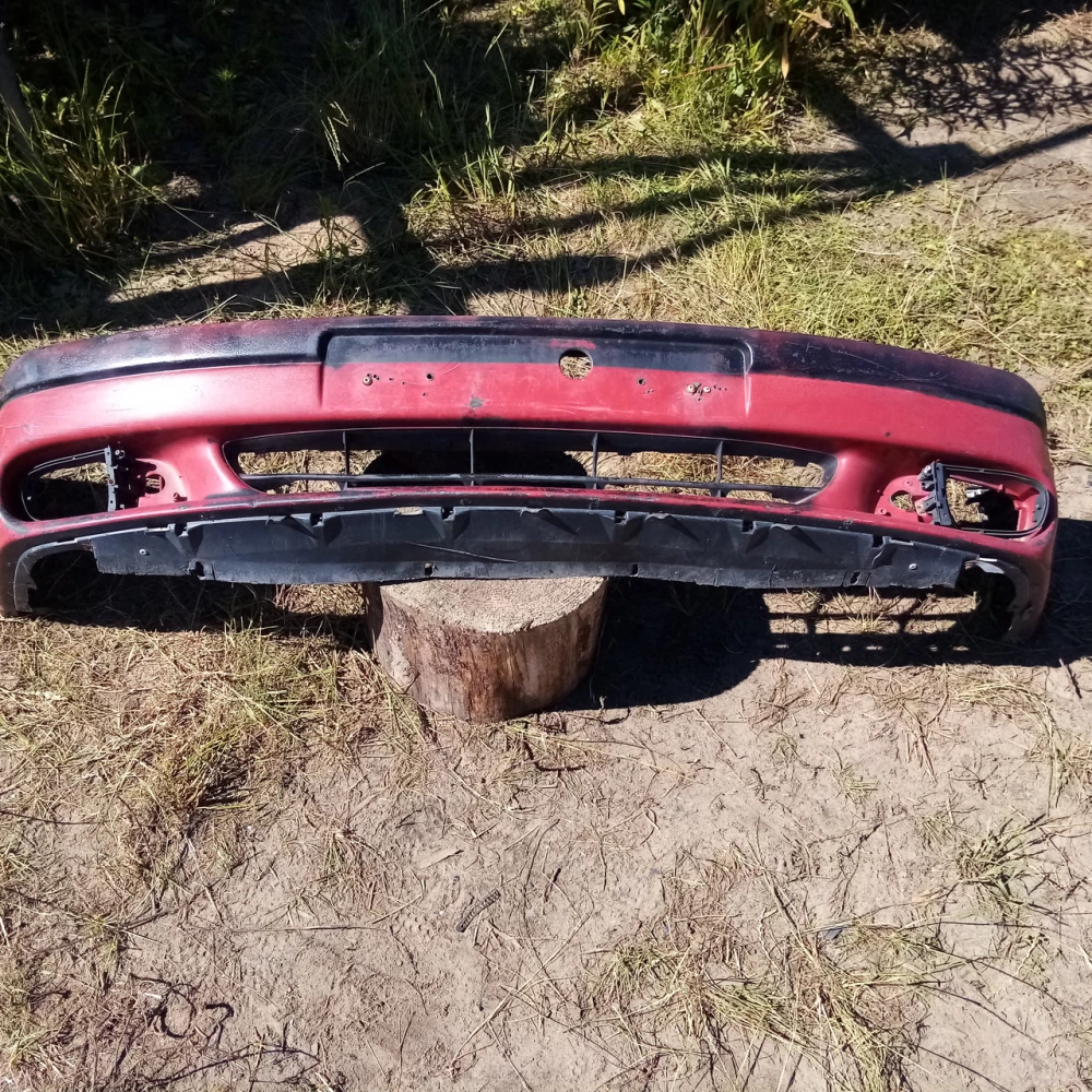 Передний бампер Seat Toledo код 7700821502