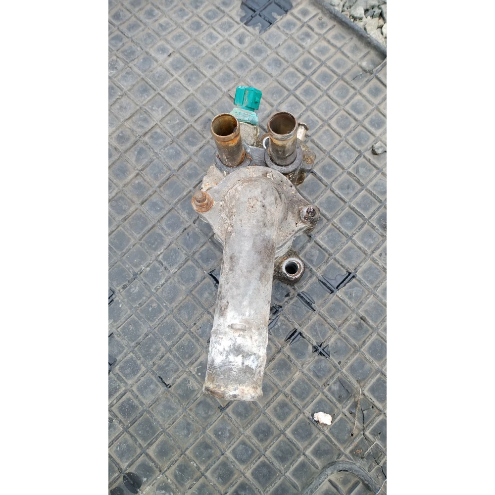 E060100005 корпус термостата Geely Mk2