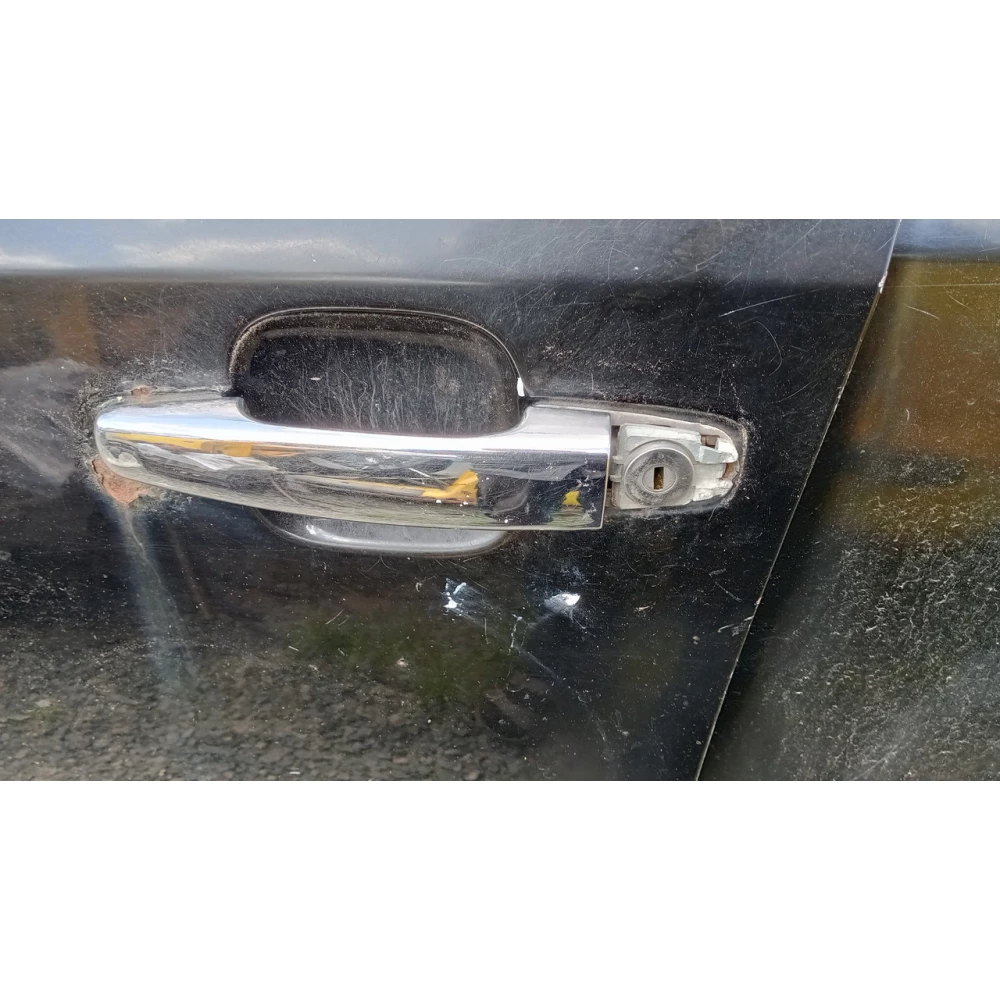 1018005039-01 передняя левая ручка двери Geely Mk 2