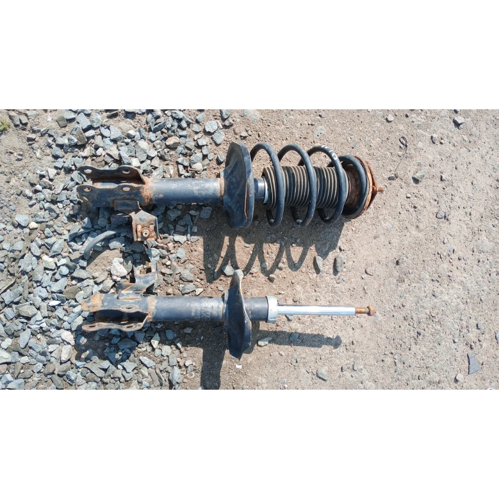 Переднее стойки Nissan Almera N16