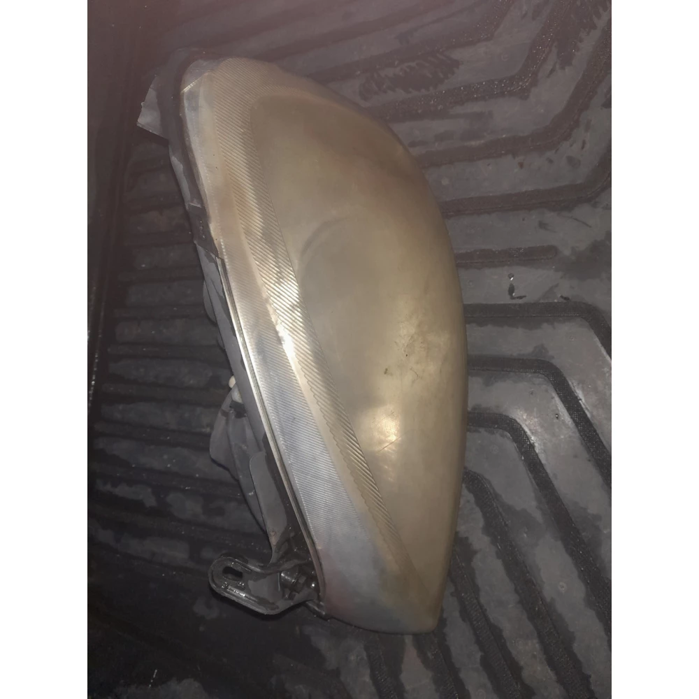 Левая фара Opel Corsa