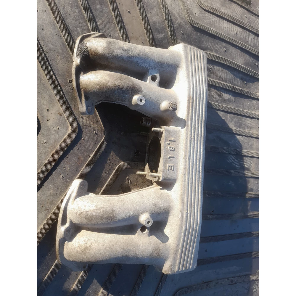 17276569f впускной  колектор BMW E36 1.6
