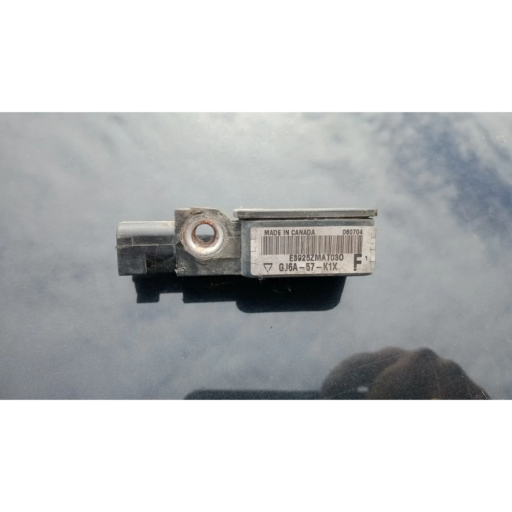 Gj6a57k1x датчик удара Мазда 6