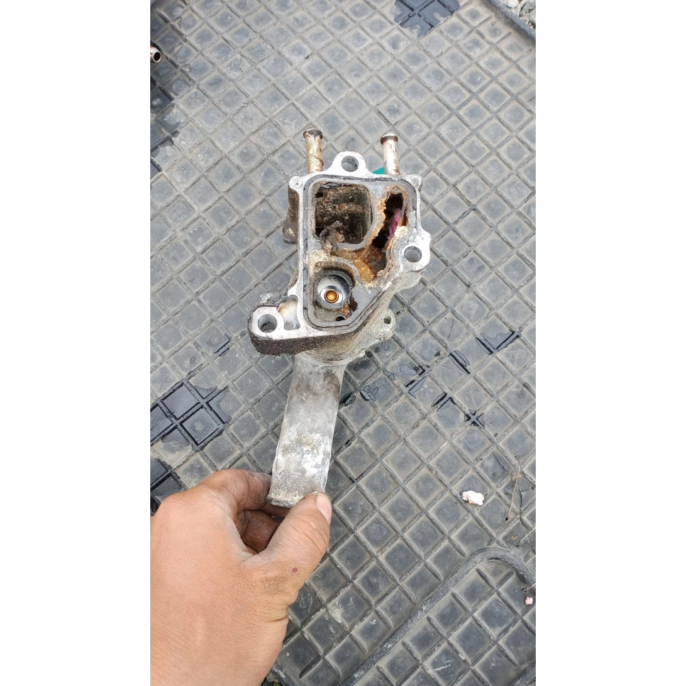 E060100005 корпус термостата Geely Mk2