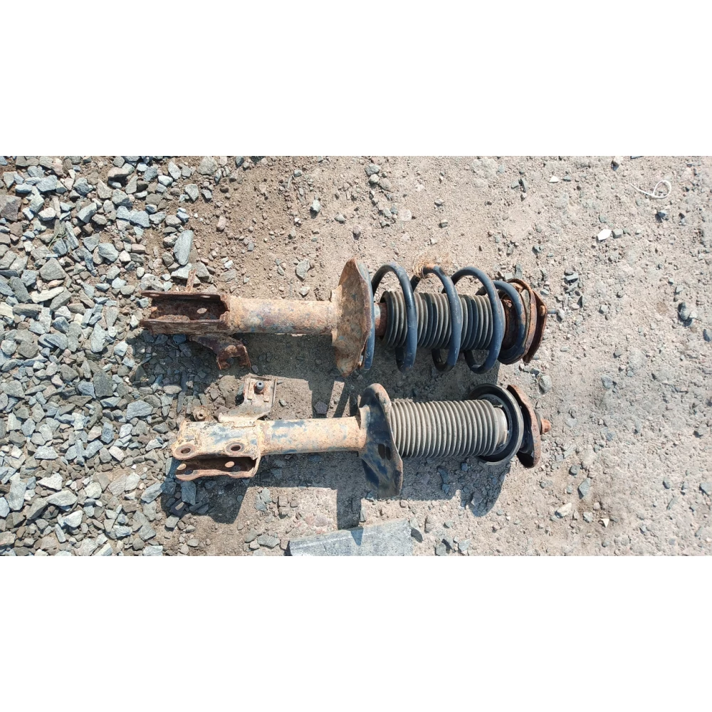 Переднее стойки Nissan Almera N16