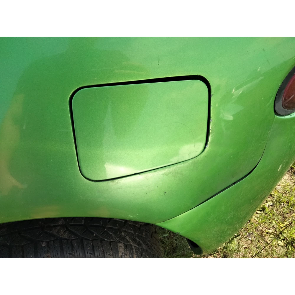 Лючок бензобака Mazda 323F BA