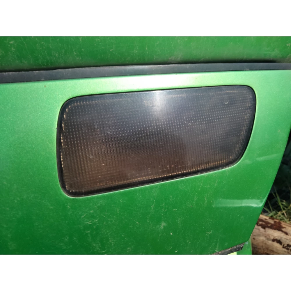 Фонарь задний в ляду Mazda 323F BA левый правый