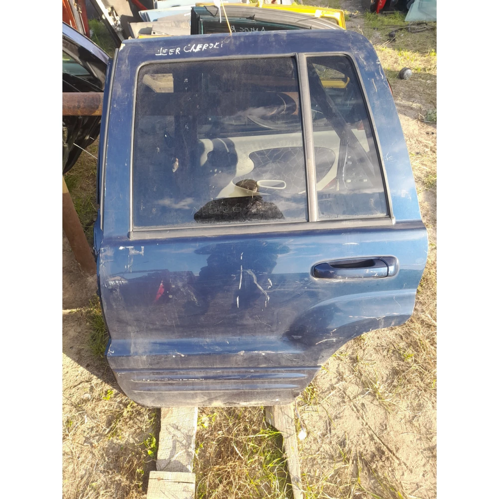 Задняя левая дверь Jeep Grand Cherokee