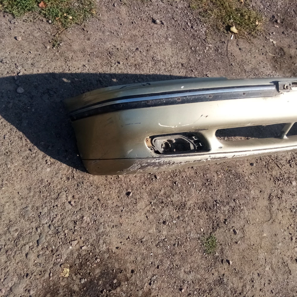 Передний бампер Daewoo Nexia 96169762