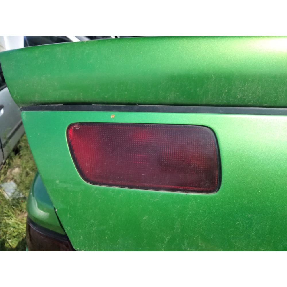 Фонарь задний в ляду Mazda 323F BA левый правый
