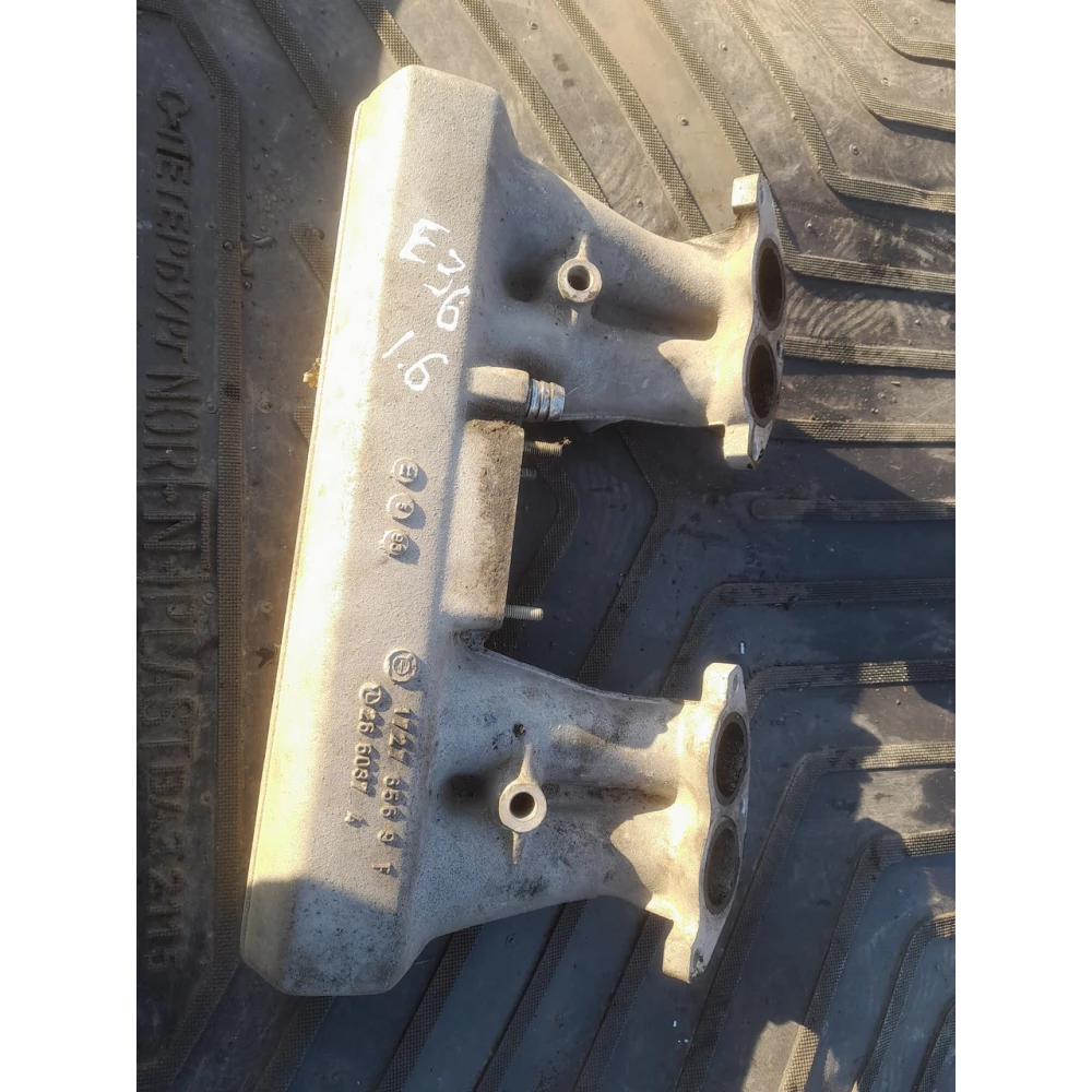 17276569f впускной  колектор BMW E36 1.6