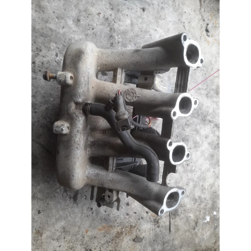 030129713 впускной колектор  Vw Golf 2 1.3