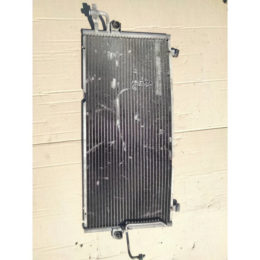 Радіатор кондиціонера Nissan Primera P11 1.6/1.8/2.0